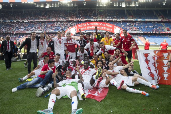 The Team of FC Sion celebrates the victory after the Swiss Cup final soccer match between FC Basel and FC Sion at the St. Jakob-Park stadium in Basel, Switzerland, Sunday, June 7, 2015. (KEYSTONE/Patrick Straub)