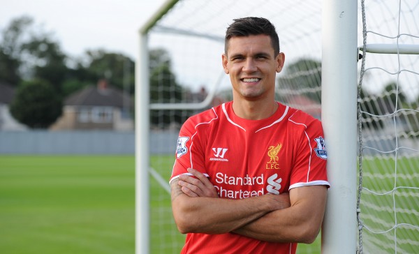LIVERPOOL, ENGLAND - JULY 26: (THE SUN OUT, THE SUN ON SUNDAY OUT) (EXCLUSIVE COVERAGE) (PREMIUM PRICING APPLIES) (MINIMUM PRINT/BROADCAST FEE OF GBP 150, ONLINE FEE OF GBP 75 PER IMAGE, OR LOCAL EQUIVALENT) Dejan Lovren poses as he is unveiled as a new signing for Liverpool Football Club at Melwood Training Ground on July 26, 2014 in Liverpool, England. (Photo by Nick Taylor/Liverpool FC via Getty Images)